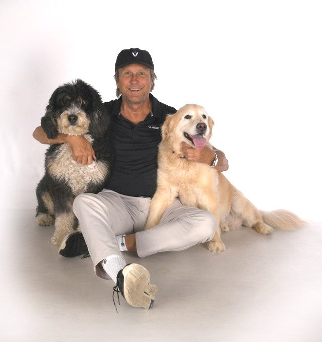 Picture of Founder Richard Vlasic with his 2 dogs